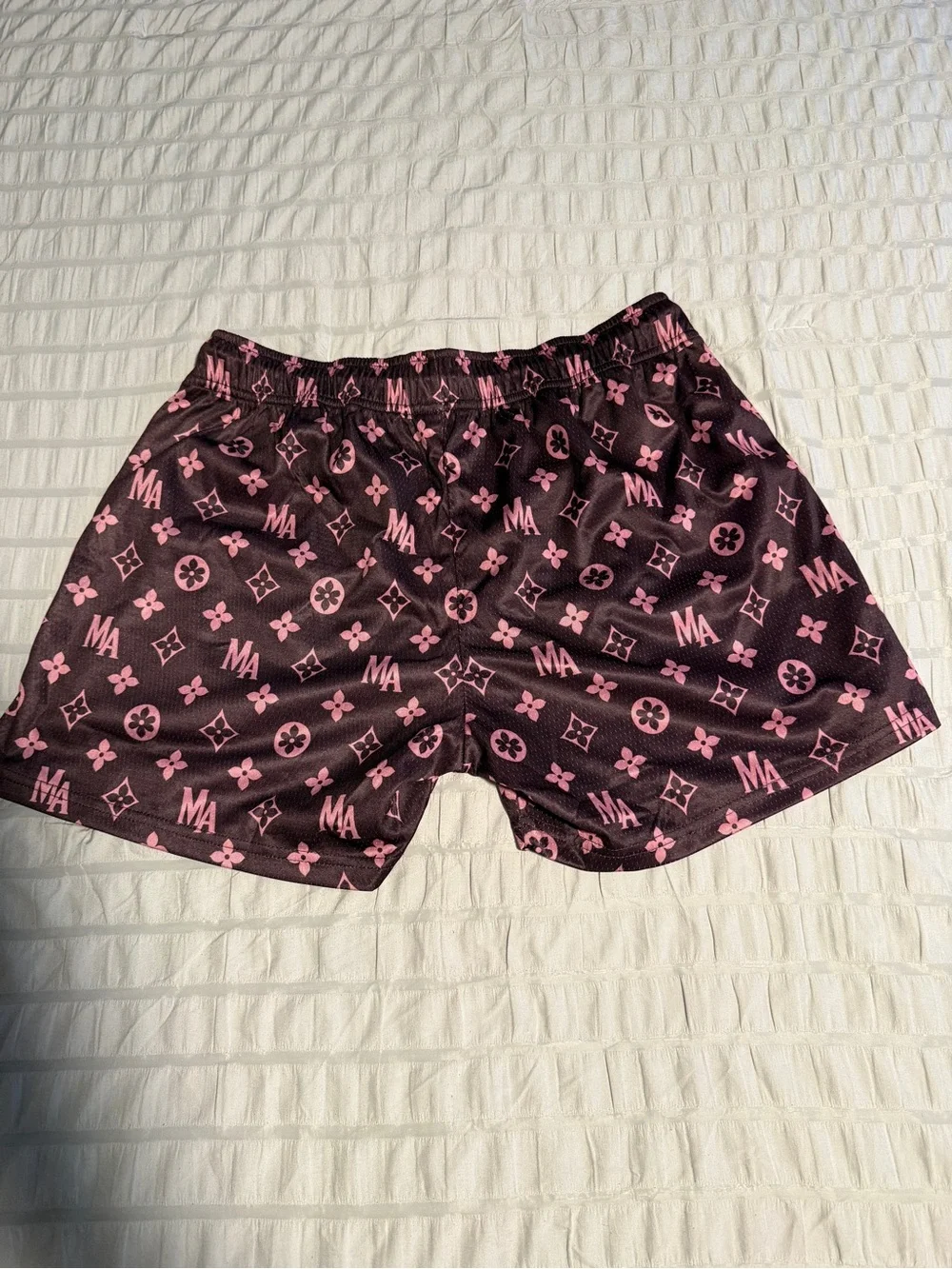 Maison Allure Pink on Black Monogram Swim Shorts